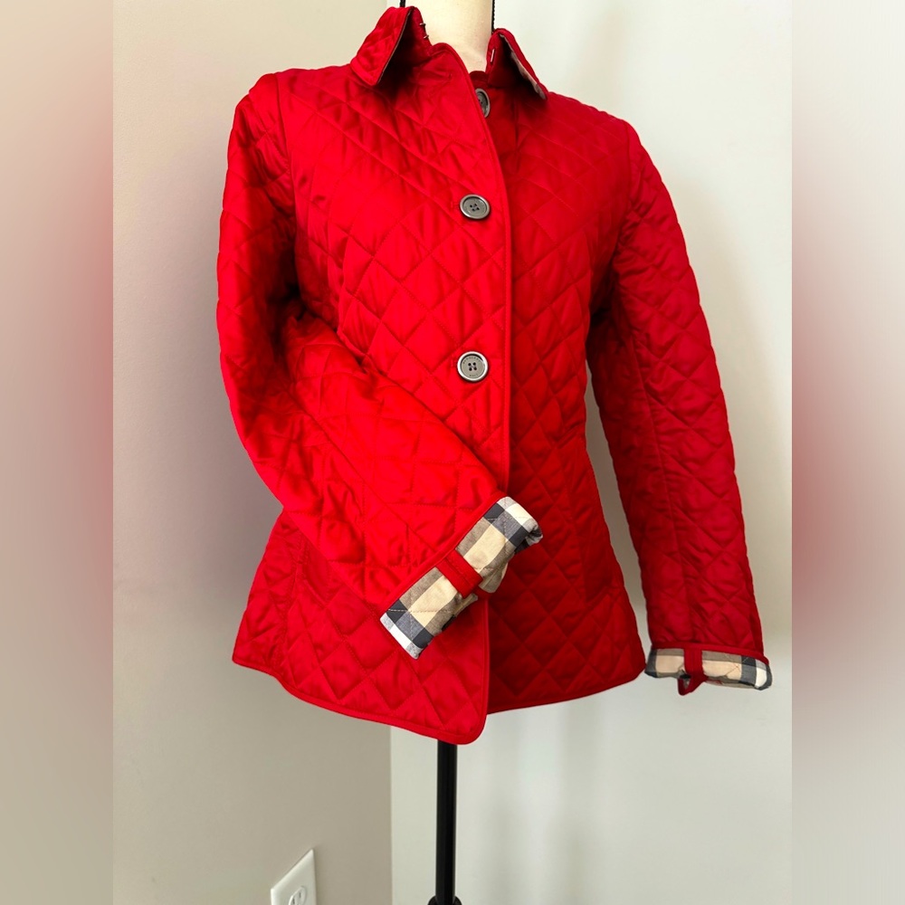 Ladies Burberry Brit quilted jacket. Barely worn. May have worn 4 times.